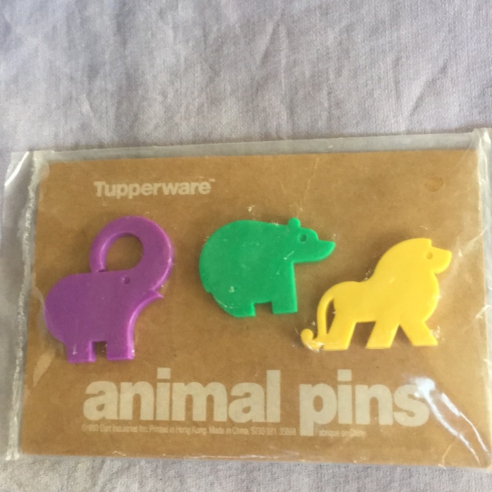 Tupperware animal pins